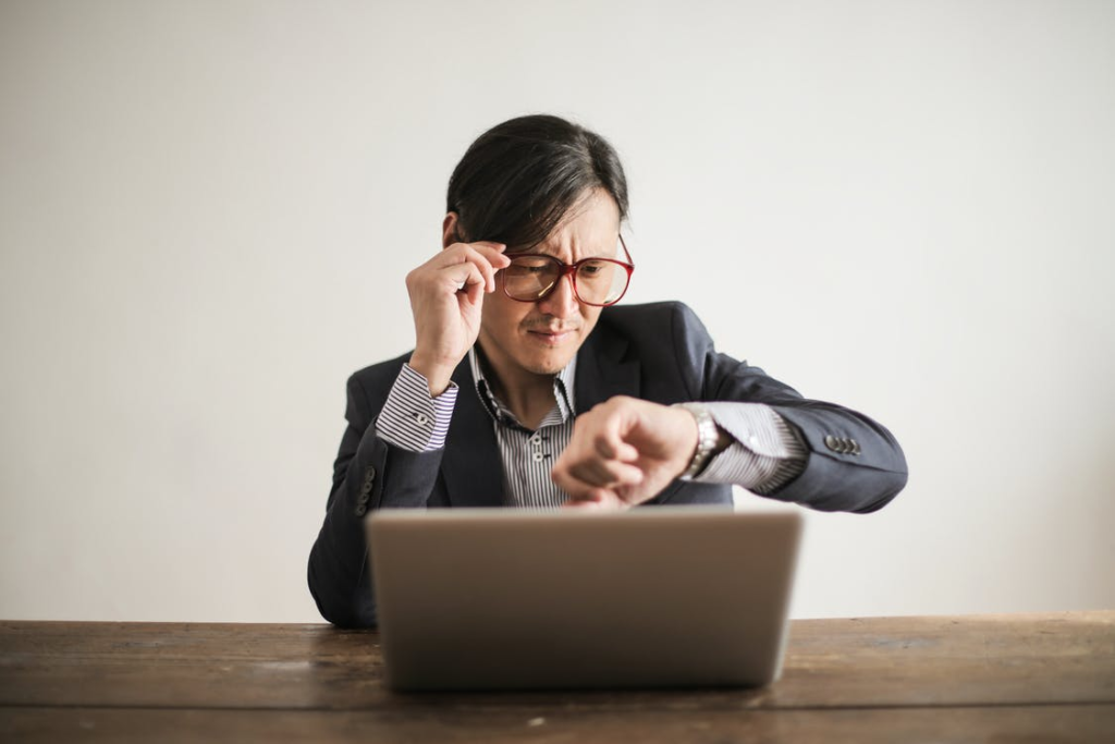 employee checking the time during work hours