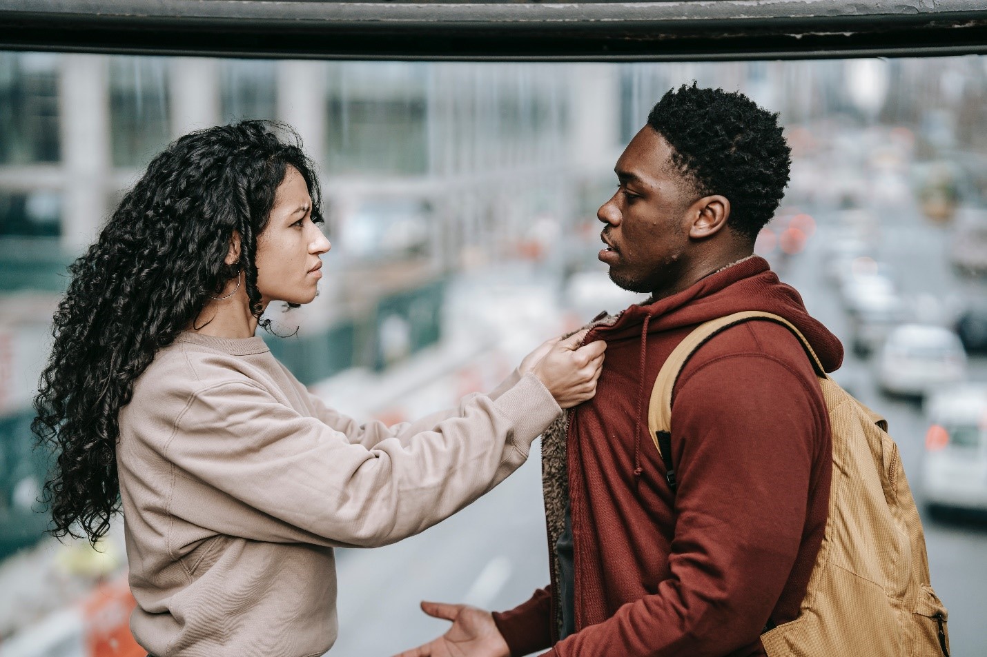 A couple having a conflict on the street